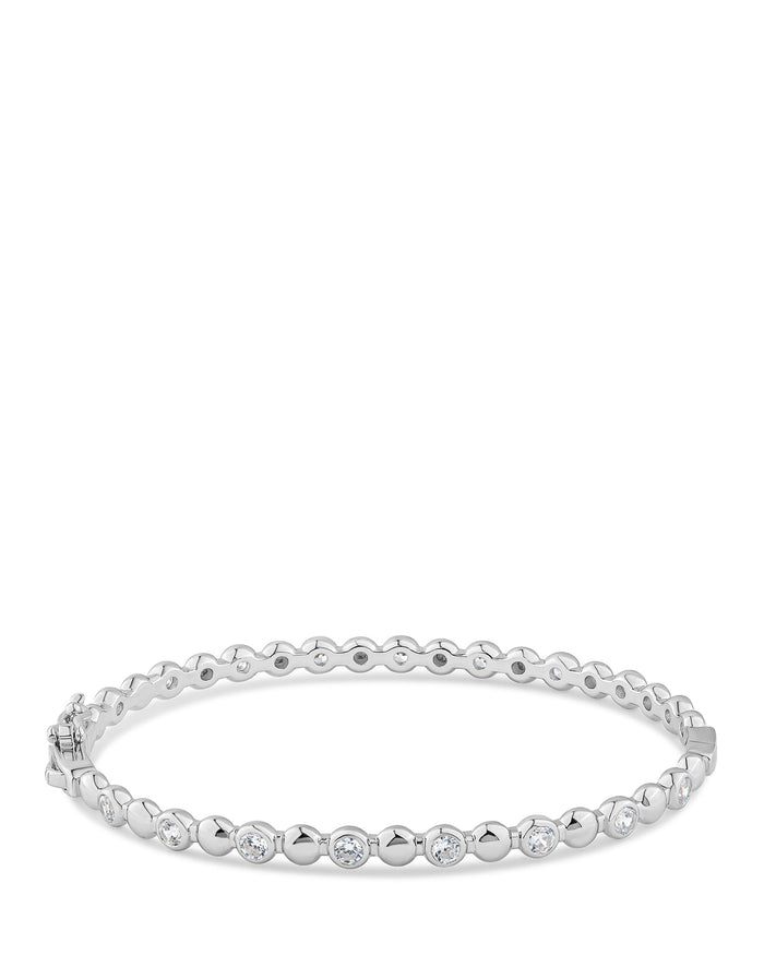 Brazalete rígido alternado de zirconias cúbicas redondas y metal en latón bañado en oro o en rodio, foto 2