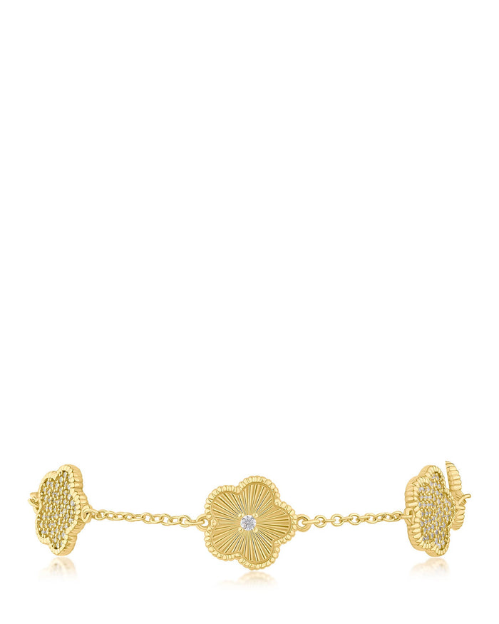 Pulsera de tréboles alternados con zirconias cúbicas pavé en latón bañado, foto 1