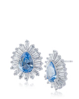 Aretes con zirconias cúbicas talla pera azul claro y baguettes en latón bañado en rodio