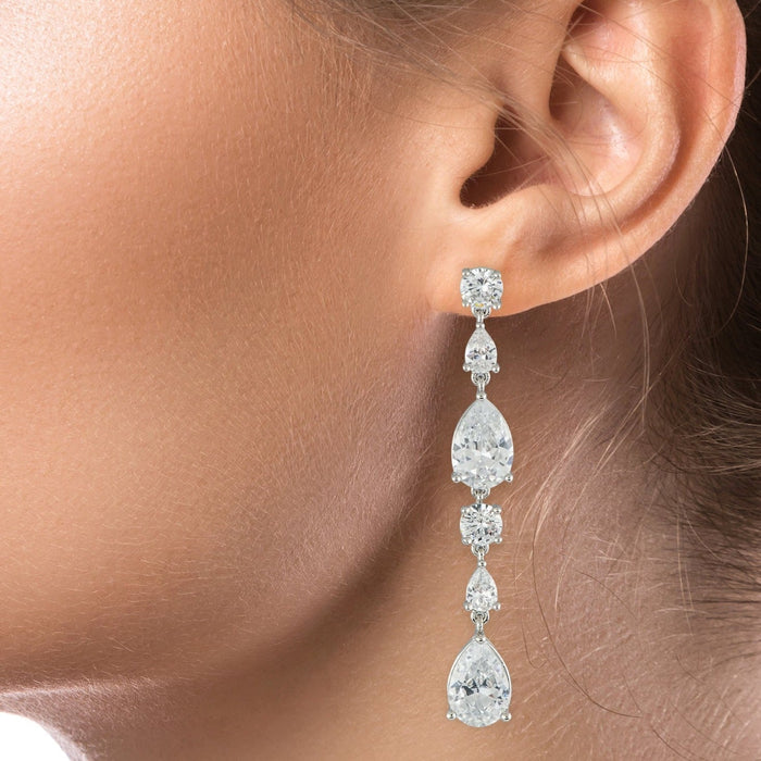 Aretes colgantes lineales con zirconias cúbicas en forma de pera y redondas alternadas en plata de ley, foto 2