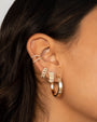 Aretes de aro huggie gruesos con muescas en oro de 14K, foto 3