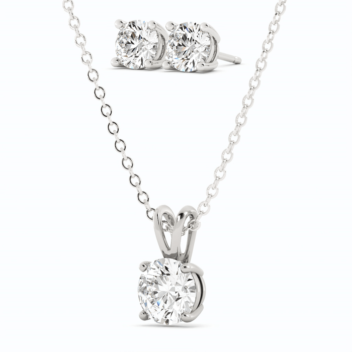 Conjunto de aretes y dije de moissanita en plata bañada en oro, foto 1