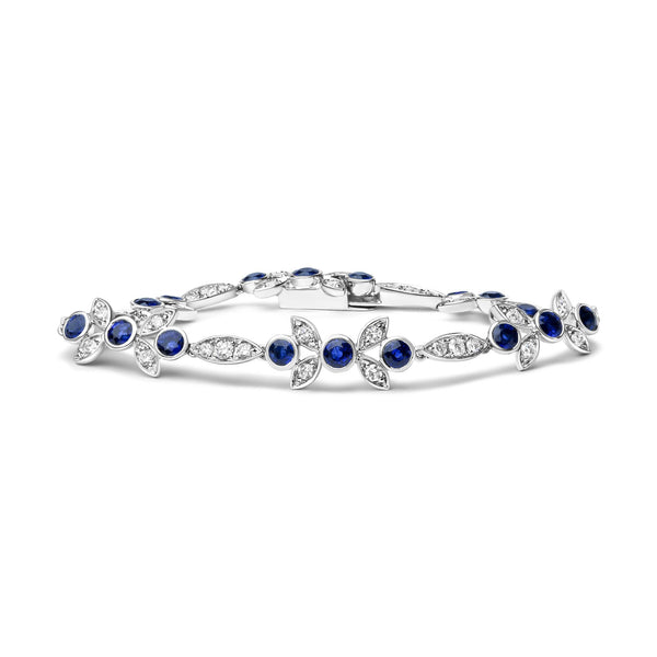 1 3/4 Ct. T.W. Diamond and 3x3mm Round Blue Sapphire Gemstone Floral Link Bracelet in 18K White Gold, photo 1