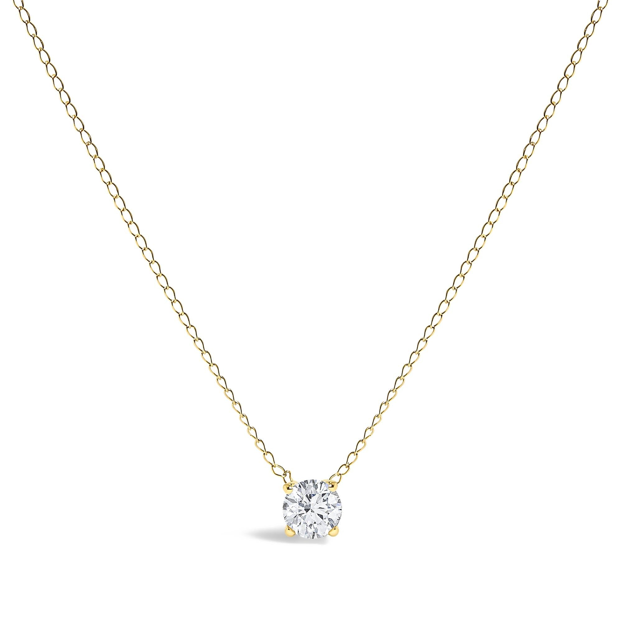 1/2 Ct. T.W. Floating Lab-Grown Diamond Solitaire Pendant Necklace in 14K Gold, photo 1