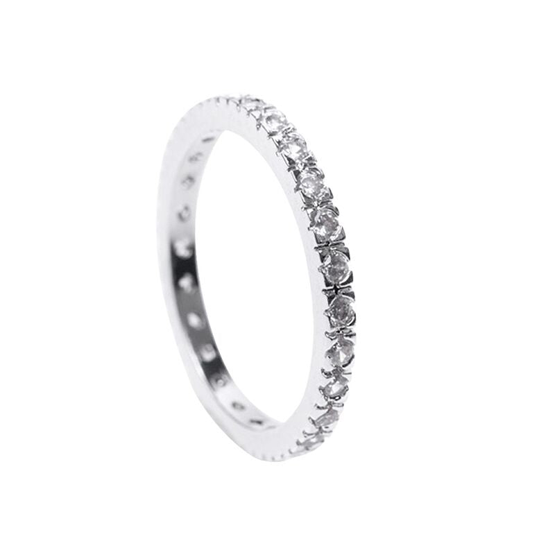 Anillo de eternidad clásico con zirconias cúbicas redondas en latón bañado en rodio, foto 1