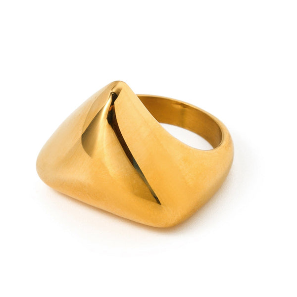 Gold tone signet ring, 18K gold plated, with a sculpted wave-contour signet face and smooth rounded band in a mirror high-polish finish, no stones visible.