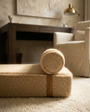 Low view of the Modern Day dog bed's boucle cushion and bolster