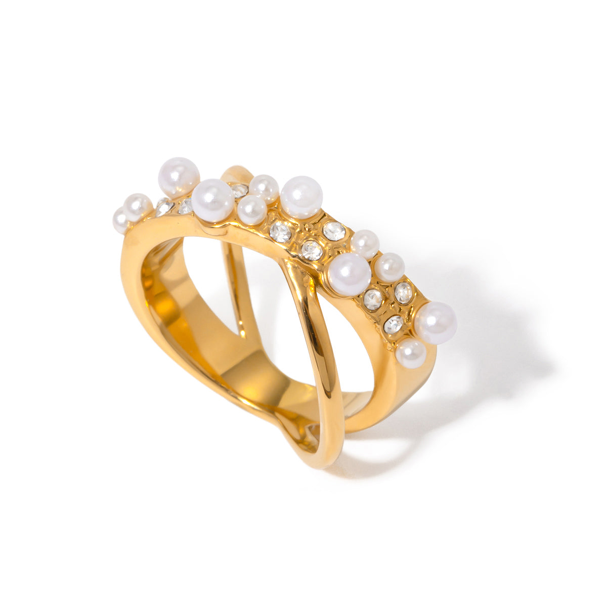 Gold tone statement ring, 18K gold plated, with a double band silhouette featuring clustered pearl accents and clear pavé crystal details along the top, no other stones visible.