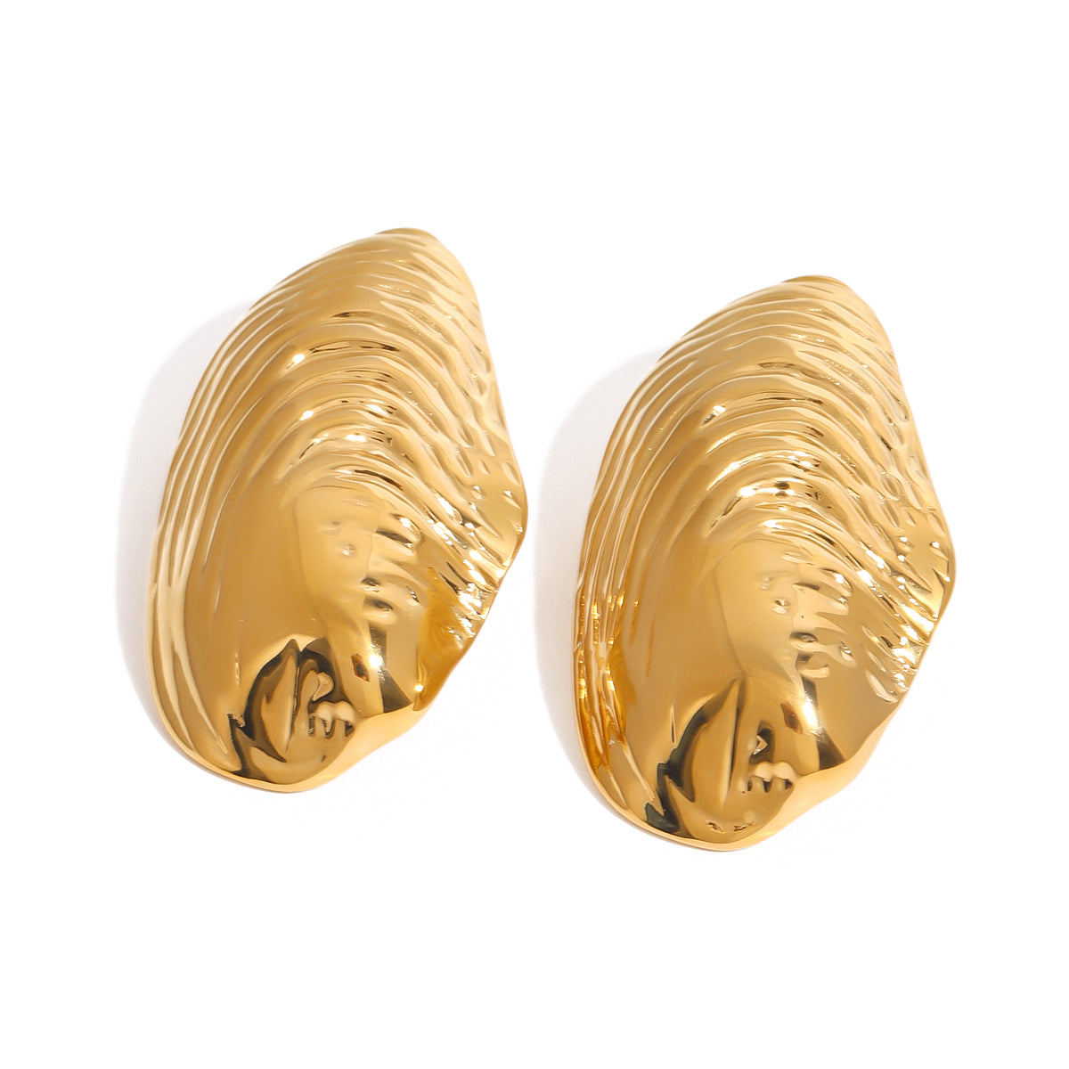 Gold tone stud earrings, 18K gold plated, in domed oval shapes with wave-like rippled ridges and a mirror high-polish finish, no stones visible, post-back not visible.