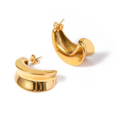 Gold tone crescent stud earrings, 18K gold plated, in sculpted domed crescent shapes with smooth rounded edges and mirror high-polish finish, no stones visible, post visible.
