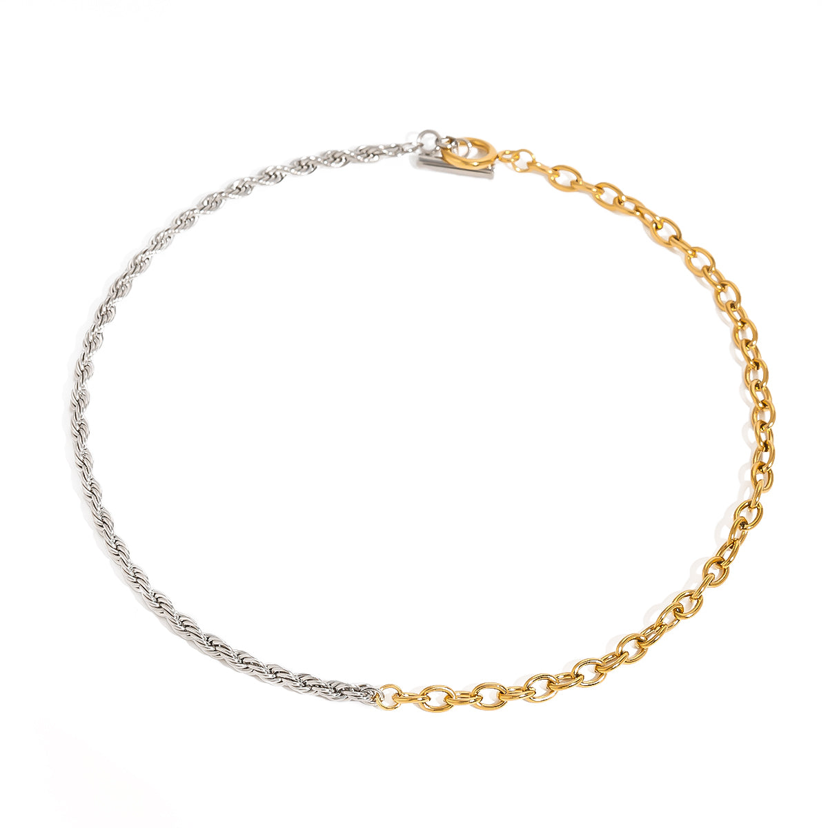 Two tone gold tone and silver tone chain necklace, 18K gold plated, with one side of twisted rope links and one side of glossy oval links, toggle clasp visible, no stones visible.