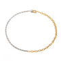 Two tone gold tone and silver tone chain necklace, 18K gold plated, with one side of twisted rope links and one side of glossy oval links, toggle clasp visible, no stones visible.